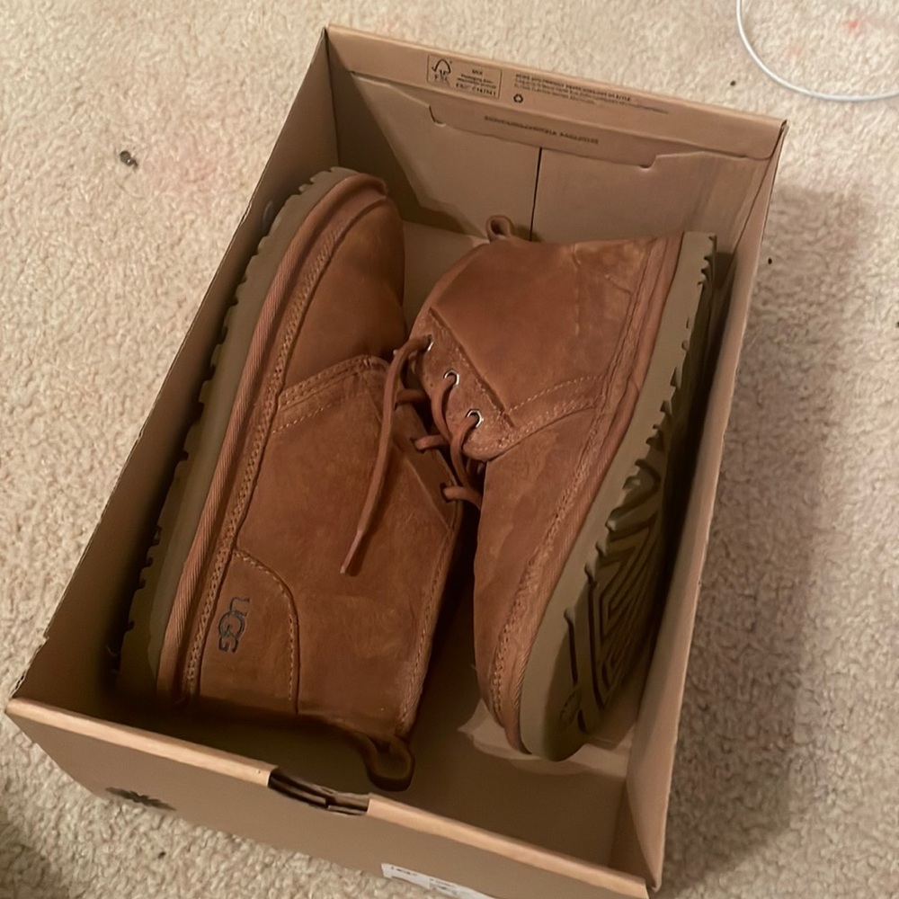 slightly worn neumel ugg boots.